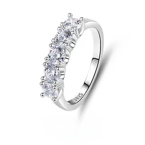 Detail showing S925 sterling silver hallmark and five-stone arrangement on the ring