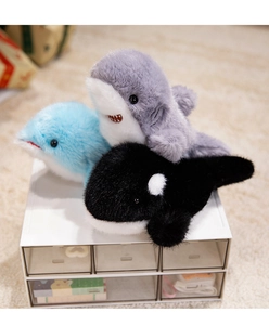 Détail de peluches d'animaux marins doux avec une texture de fausse fourrure fine