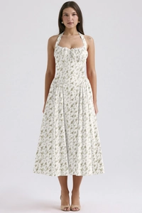 Detail of floral halter dress showing waist drawstring and green botanical prints