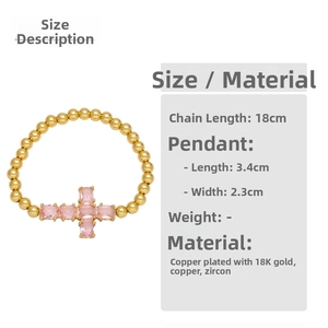 Detail of 18K gold-plated beaded bracelet with pink zircon cross pendant and size specs