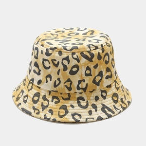 Close-up of leopard print cotton bucket hat showing stitching and canvas texture