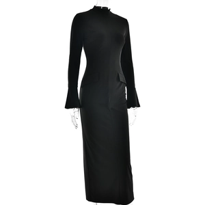Detail view of black high neck maxi dress with flared sleeves on a mannequin