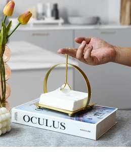 Golden iron napkin holder with crystal ball weight and stable spherical feet support