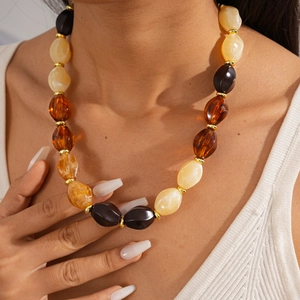 Ethnic acrylic oval beaded sweater necklace with amber and black resin beads for women