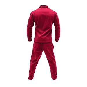 Rear view of men's red faux suede tracksuit showing smooth velvet texture and jacket fit