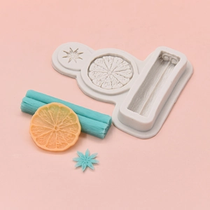 Silicone baking mold with star anise citrus slices and cinnamon stick patterns