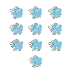 Close-up of ten light blue enamel pet paw alloy pendants for DIY jewelry making