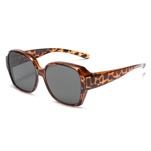 Close-up of tortoise shell polarized sunglasses for women with dark grey lenses