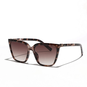 Classic tortoise square sunglasses with gradient brown lenses and metal rivet accents