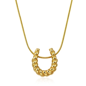 Detailed view of a gold titanium necklace featuring a textured U-shaped twisted pendant