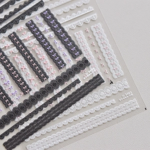 Exquisite 3D embossed lace bow nail stickers in black and white for DIY manicure art