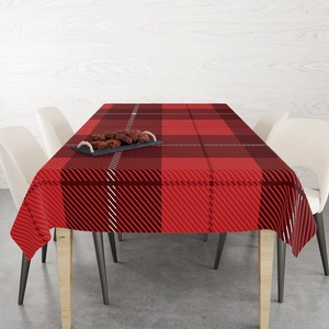 Detail of red and black plaid cotton linen tablecloth with non-slip texture for Christmas
