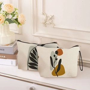 Modern ink print canvas makeup bags with elegant floral patterns and black zipper