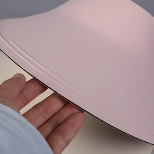 Detail shot of the pink sun hat brim with double stitching and non-slip lining