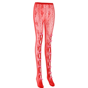 Détails de legging en résille rouge avec des nœuds roses et des motifs floraux