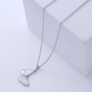 Minimalist titanium steel butterfly necklace with white mother-of-pearl inlay on stone