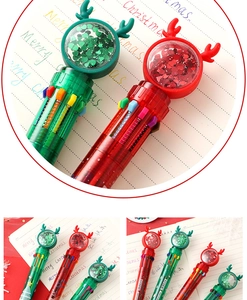 Close-up of Christmas multicolor pens with deer antlers and sequins detail showing 10 colors