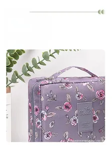 Détails de la trousse de maquillage florale avec double zip et tissu imperméable