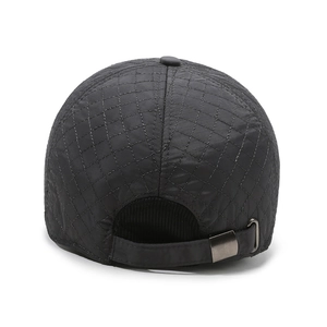Rear view of black quilted winter baseball cap with adjustable metal buckle and ear flaps