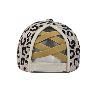 Detail of leopard print baseball cap with elastic criss-cross bands for high pony-tails