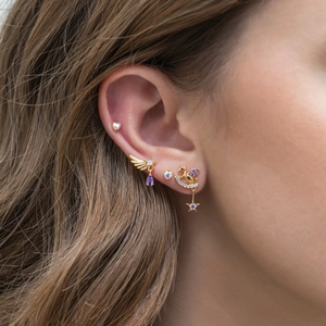 Golden angel wing and unicorn stainless steel cartilage stud earring set with purple gems
