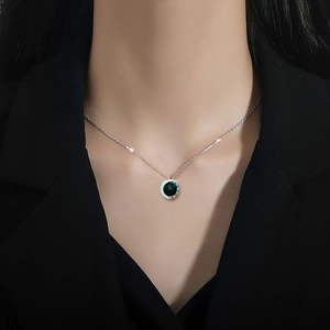Titanium steel silver necklace with double-sided Roman pendant on a female model