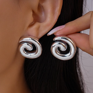 Chic silver acrylic spiral shell earrings with a polished finish for a modern fashion look