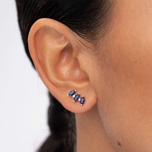 Detailed close-up of S925 silver ear cuff featuring blue marquise-cut zircon stones