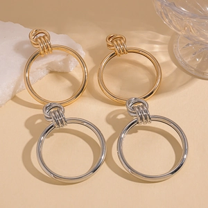 Two-tone geometric twisted circle drop earrings in gold and silver finish for women