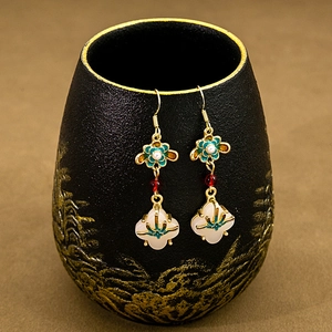 New Chinese-style retro water drop tassel earrings with faux jade and gold metal accents