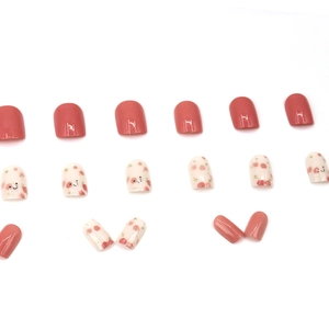 Pink smiley face and cherry pattern press-on nails set with glossy coral finish