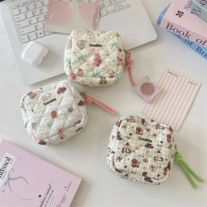 Quilted cotton sanitary pouch with cute rabbit and bear prints and zipper detail
