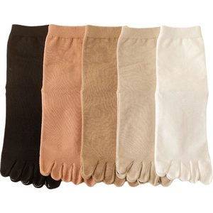 Breathable five-toe socks set in black, beige, and white colors for acupressure massage