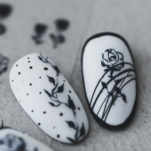 Minimalist black and white ink style nail stickers with rose and matte texture