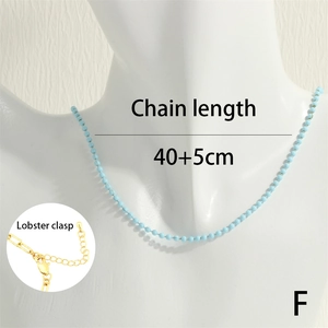 Light blue beaded necklace with golden lobster clasp and 40+5cm adjustable chain