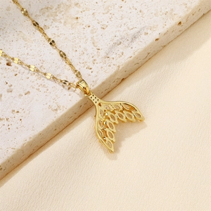 Elegant gold fishtail pendant necklace featuring sparkling white zircon on a stone base