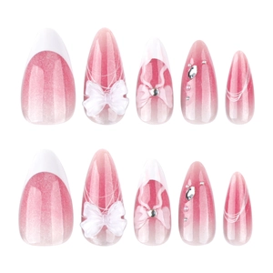 Almond shaped gradient cat eye press-on nails with 3D white bows and silver rhinestones