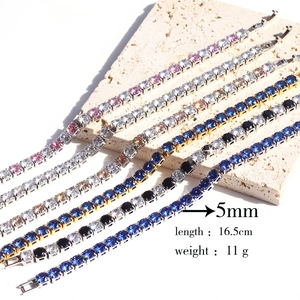 Detailed view of 5mm colorful zircon tennis bracelets in silver and gold settings