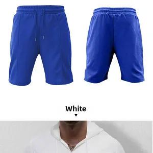 Detail of blue men's athletic shorts featuring waffle texture mesh and drawstring waist
