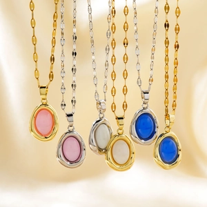 Elegant egg-shaped pendant necklaces with colorful gemstones on gold and silver chains