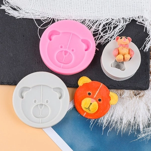 Dettaglio degli stampi rotondi in silicone per orsi con trama a cucitura per fondente e dolci