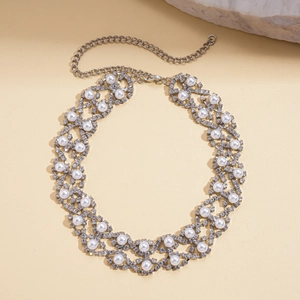 Detail of double-layer flower necklace with sparkling rhinestones and white pearls