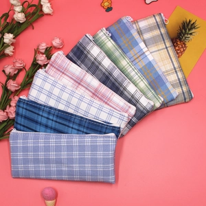 Large capacity canvas pencil case with trendy plaid pattern and zipper closure
