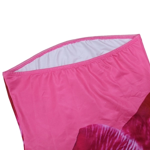 Detail of pink spandex fabric showing professional hemmed edge and floral print pattern