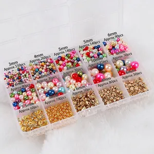 Kit bijoux avec perles blanches et dorées dans une boîte de rangement à 15 cases