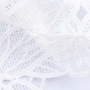 Elegant white lace blouse for women featuring intricate embroidery and breathable mesh details