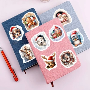 56Pcs 3D Christmas stickers with Santa and reindeer on a colorful notebook cover