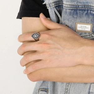 Vintage stainless steel devil eye ring with sunburst texture and center stone for men