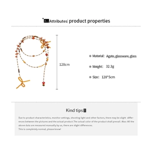 Detailed specs of crystal beaded bow necklace showing 128cm length and 32.3g weight