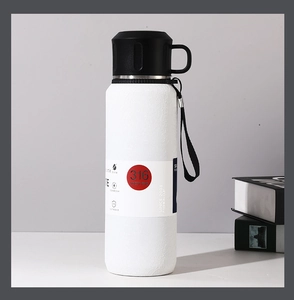Close-up of 316 stainless steel vacuum flask with matte finish and tactical handle lid